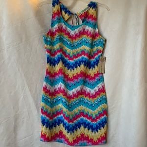 BRAND NEW Supper colorful. Cute cut out on back.Fun summer dress